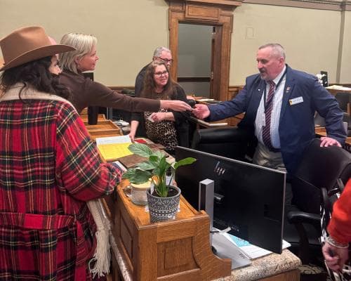 Wyoming Lawmakers Caught Accepting Checks on Capitol Floor