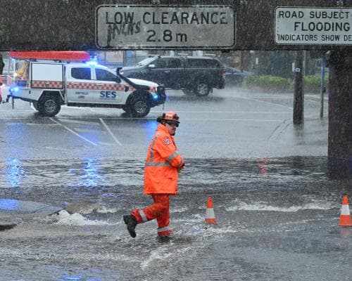 Heavy Summer Rain Brings Flood Alerts and Shark Warning in Australia