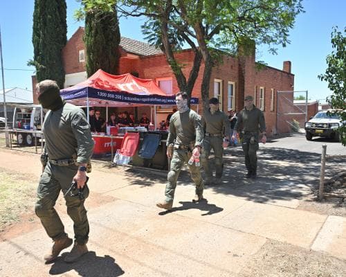 NSW Manhunt After Three Killed, Trump Cancels Canada Peace Invite, Twins' Miracle Surgery