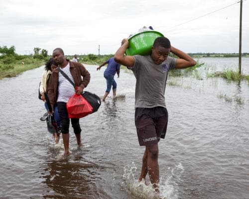 Floods kill 100+ in southern Africa, crocodiles add new danger.